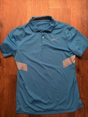 Nike Men’s Light Blue Performance Polo with White Stripe Accents